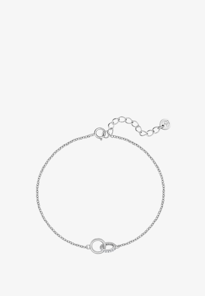 Bracelet délicat en chaîne d'argent avec deux breloques circulaires entrelacées, dont une incrustée de petits cristaux clairs, et une fermeture à mousqueton avec rallonge.