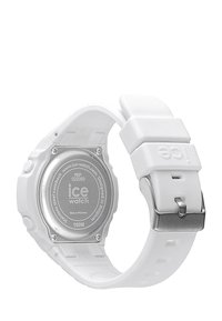 Orologio da polso in silicone bianco con retro in acciaio inossidabile, dotato di quadrante quadrato e fibbia argentata per una vestibilità regolabile. Impermeabile fino a 100 m.