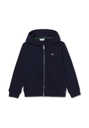 Marineblauwe hoodie met ritssluiting, gemaakt van zachte stof, met een klein groen logo op de borst, twee zakken aan de voorkant en een capuchon met trekkoord.