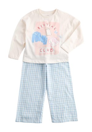 Haut blanc à manches longues pour enfant avec illustrations et texte sur le thème du coucher, accompagné d'un pantalon de pyjama à carreaux bleu clair et blanc.