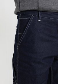 Carhartt WIP RUCK SINGLE KNEE PANT - Calças de ganga de perna direita - blue rigid