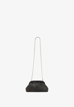 Mustikkakuvioinen hihnatasku, jossa on kaareva pohja ja ketjuolkaimi. Ominaisuuksiin kuuluu pörröinen kangas ja turvallinen yläkiinnitys.