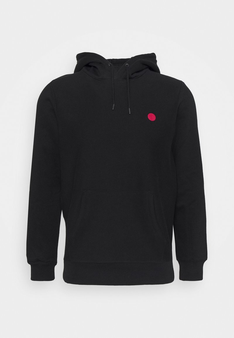 Black hoodie made of cotton blend, featuring a front pocket, drawstring hood, and a small red circle logo on the chest. Soft texture.