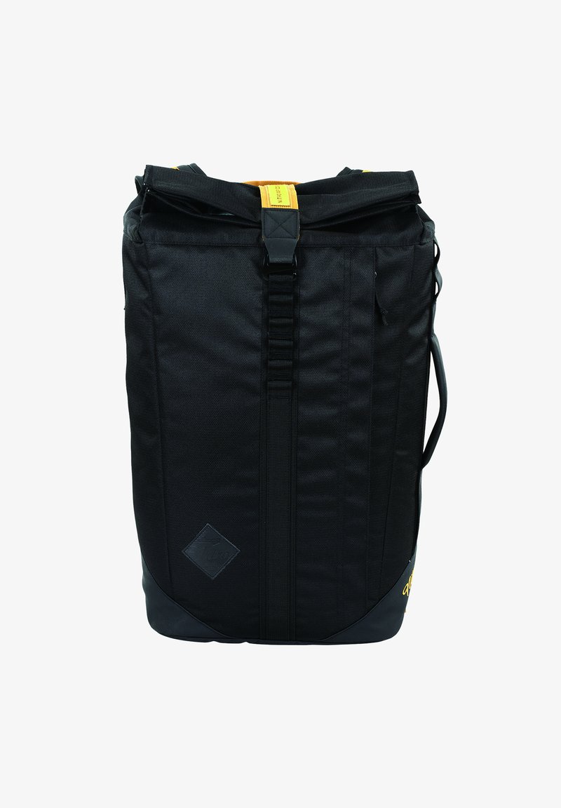 Black backpack with a textured fabric finish. Features a yellow strap and durable buckle, accented with a black rubber base and side handle.