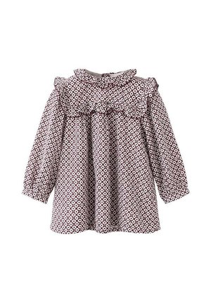 Bluse mit braun-weißer Musterung, langen Puffärmeln, rüschigem Kragen und lockerer Passform. Hergestellt aus leichtem Stoff.