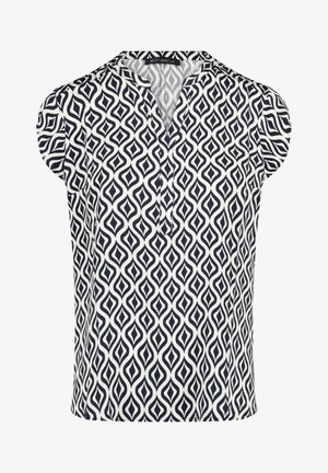 Sleeveless white blouse with black abstract geometric pattern and a V-neckline with a partial front placket.