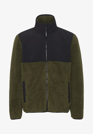 Polarowy zamek z wysokim kołnierzem. Olivkowa podstawa z czarnym syntetycznym wierzchem. Posiada zamek z przodu i boczne kieszenie. Teksturowany, miękki materiał.