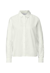 Camisa blanca de botonadura con cuello, con mangas largas y detalles de ojales intrincados en las mangas. Fabricada en una tela ligera.