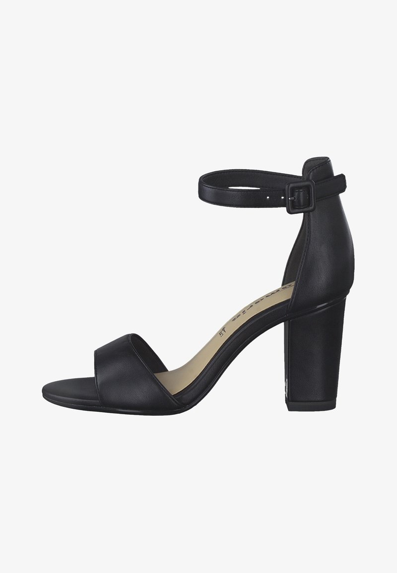 Black leather heeled sandals with an ankle strap, open toe, wide front band, and a chunky block heel. Smooth texture, minimalist design.