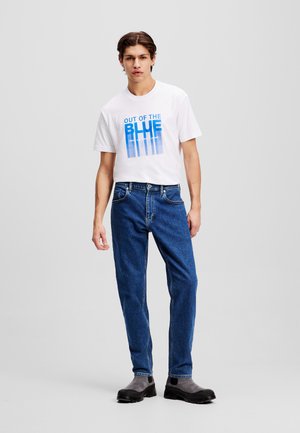 Jeans Tapered Fit - washed mid blue