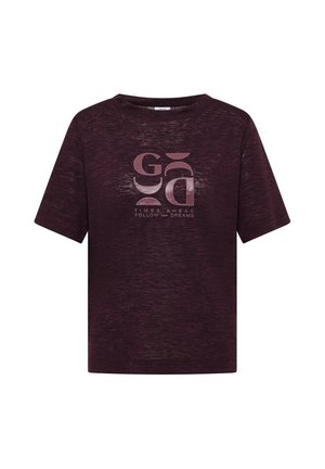 T-shirt à manches courtes violet foncé avec des formes abstraites roses et le texte "TIMES AHEAD FOLLOW your DREAMS" sur le devant.