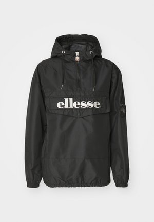 Veste coupe-vent noire à capuche avec fermeture éclair frontale, cordons, poignets élastiques et grand logo blanc ellesse sur la poche poitrine.