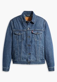 Veste en jean bleu foncé au design classique, avec deux poches poitrine et des boutons en métal, présentant une texture à motif subtil sur l'ensemble.