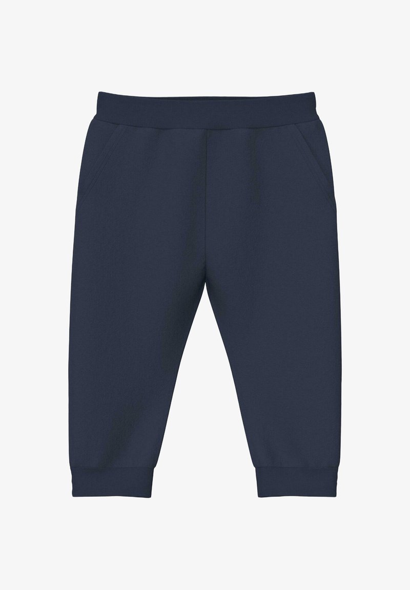 Pantalon de survêtement bleu marine mi-long avec taille élastique, poches latérales et poignets côtelés.