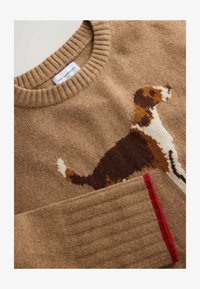 Unselected, camel brown dog graphic