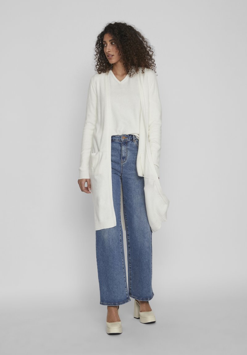 Vila damstickning VISIQUIN - White