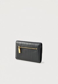 Black leather wallet with vertical stitch lines and a gold zippered pocket on the front against a plain light background.
