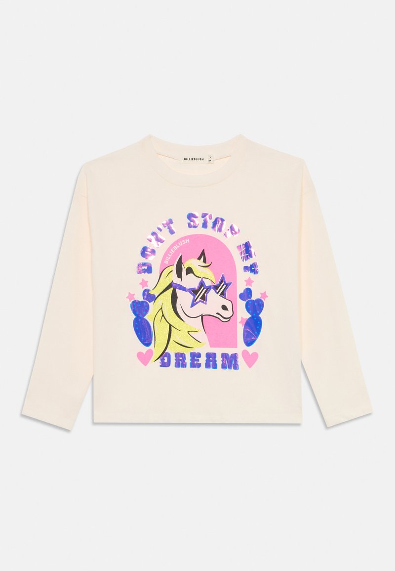 Cremefarbenes Langarm-T-Shirt mit einem Einhorn-Design, buntem Text "HÖR NICHT AUF, MICH ZU TRÄUMEN" sowie Herz- und Kaktus-Akzenten.