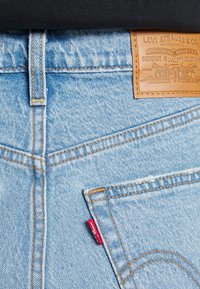Levi's® RIBCAGE CROP BOOT - Calças de ganga bootcut - jazz away