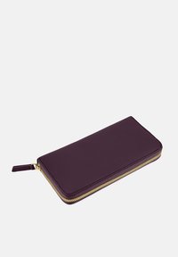 Purple leather wallet with a smooth texture, featuring a gold zipper closure and a small pull tab. Flat and rectangular design.