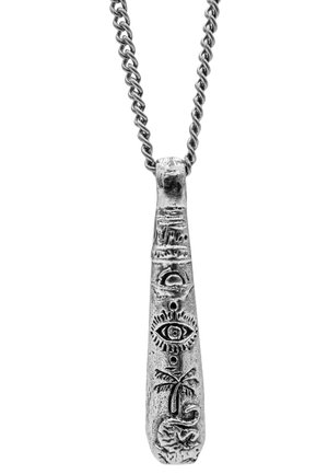Silver pendant on a metal chain, shaped like a tapered stone, featuring engraved symbols and patterns, with a textured finish throughout.
