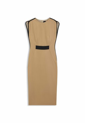 Beige istuva mekko, jossa mustat sivupaneelit, jäsennelty muoto, pyöreä pääntie ja hienostuneet saumalistat. Vetoketjusuljenta takana.