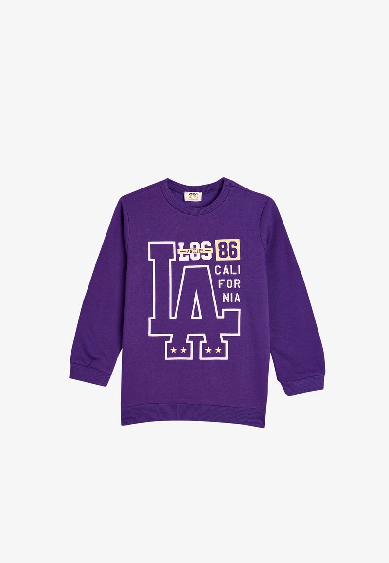 Sudadera morada de algodón con mangas largas. Presenta grandes letras blancas "LOS ÁNGELES 86 CALIFORNIA" y un diseño de estrellas en la parte inferior.