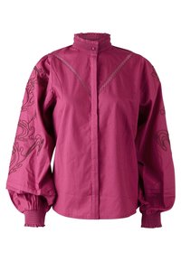 Camicia fucsia a maniche lunghe, con colletto alto, chiusura a bottoni frontale e decorazioni ricamate sulle maniche con polsini elasticizzati.