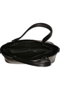 Sac à main en cuir noir avec une seule bandoulière, intérieur spacieux, deux compartiments zippés et texture lisse. Intérieur doublé d'un tissu sombre.