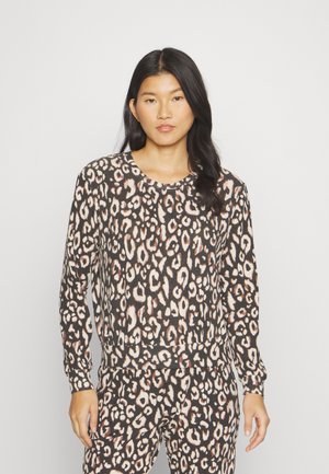 Haut à manches longues avec un motif léopard noir et beige, col rond et poignets côtelés. Fabriqué à partir d'un tissu doux et texturé.