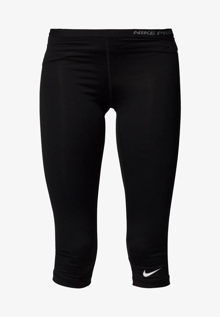 Leggings de compression courts noirs Nike Pro avec taille élastique et logo Nike swoosh blanc près de l’ourlet.