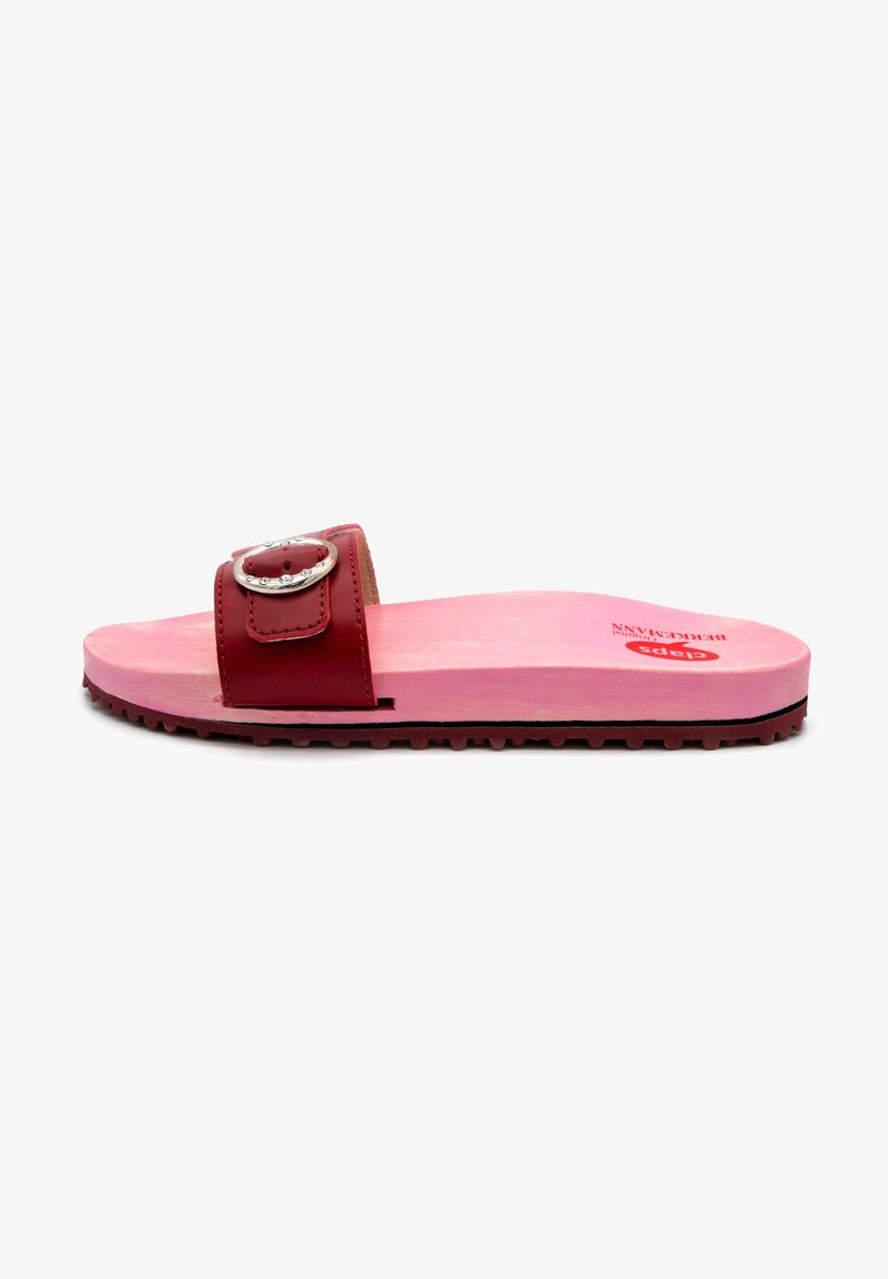 Red leather slide sandal with a central strap featuring a circular metal buckle, cushioned pink insole, and textured rubber outsole.