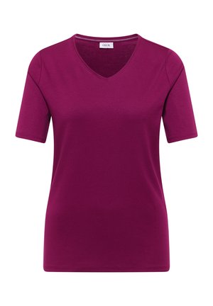 T-shirt pour femmes à manches courtes en rose foncé uni avec un col en V, coupe régulière et une petite étiquette "CECIL" au niveau de l'encolure.