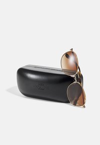 COACH Óculos de sol - shiny light gold-coloured