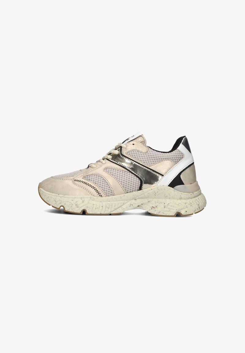 Lightweight athletic shoe in beige with mesh and leather materials, silver accents, textured rubber sole, and a padded collar for comfort.