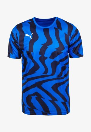 Sininen urheilupaita, jossa on aaltoileva musta kuvio, lyhyet hihat, pyöreä pääntie ja Puma-logo rinnassa. Pehmeä, kevyt kangas.