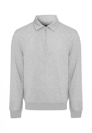 Graues Langarm-Polohemd mit halbem Reißverschlusskragen, aus weichem Material gefertigt, mit gerippten Bündchen und geradem Saum. Minimalistisches Design.