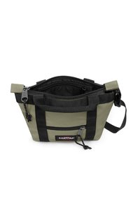 Malá khaki a černá kabelka Eastpak s hlavním oddílem na zip a přední kapsou, polstrovanou rukojetí a nastavitelným ramenním popruhem.