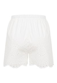 Shorts en tissu blanc avec une taille élastique et une broderie à œillets présentant des motifs floraux et circulaires, ourlet festonné, vue de face.