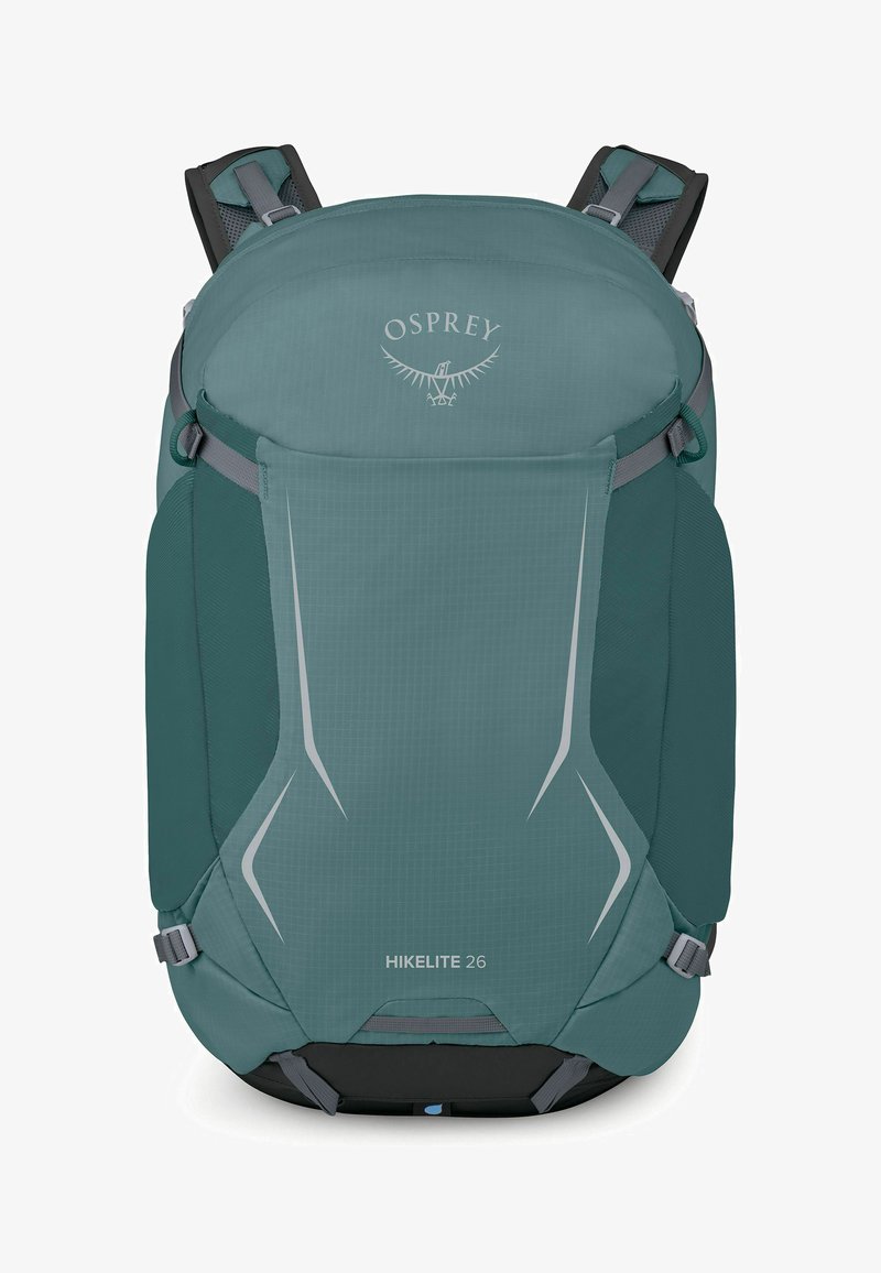Sac à dos de randonnée Teal Osprey Hikelite 26 avec bretelles rembourrées, sangles de compression latérales et accents de design réfléchissants sur le panneau avant.
