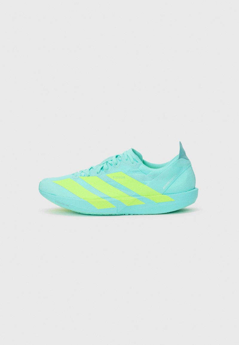 Turquoise athletic shoe with neon green stripes, smooth texture, lightweight design, and a low profile. Features lace-up closure and a padded collar.