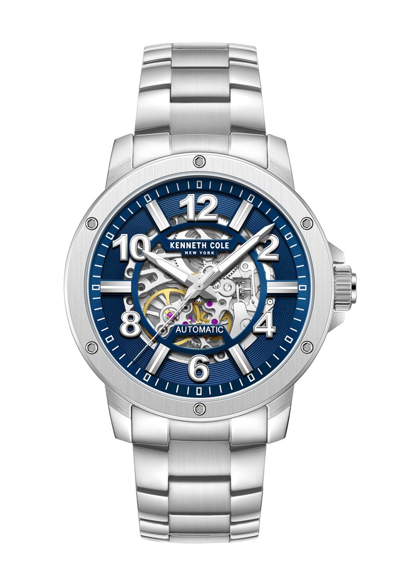 Zegarek automatyczny z stalową kopertą i bransoletą, niebieską teksturowaną tarczą, dużymi białymi cyframi oraz widocznym ruchem mechanicznym.