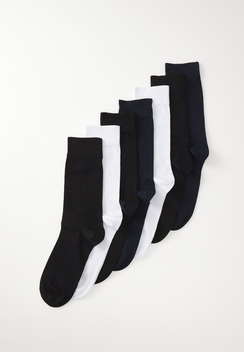 Ensemble de sept paires de chaussettes en noir, blanc et bleu marine foncé, avec un revers côtelé, une texture lisse et un design de longueur classique.