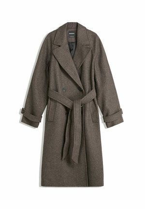 Brown wool blend trench coat featuring a double-breasted design, large lapels, side pockets, and a tie-belt at the waist. Roll-up cuff details.