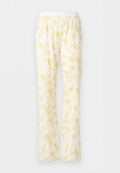Άσπρο παντελόνι με χαλαρή γραμμή και ελαστική μέση, με ανοιχτό κίτρινο λουλουδάτο μοτίβο σε όλο το ύφασμα.