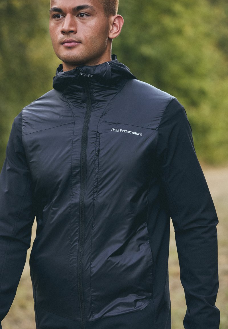 Peak Performance RADIANCE HYBRID HOOD - Outdoorjakke - black