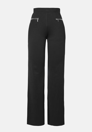 Pantalons larges noirs en tissu doux, dotés de fermetures éclair décoratives à l'avant et d'une taille haute pour un ajustement structuré.