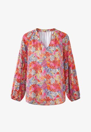 Blouse met lange mouwen en V-hals, met een kleurrijk bloemmotief in roze, rood, oranje, geel en blauwe tinten op een lichte achtergrond.