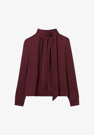 Blusa bordeaux a maniche lunghe con collo annodato, davanti plissettato e dettagli con bottoni sulla spalla. Tessuto morbido con una texture liscia.