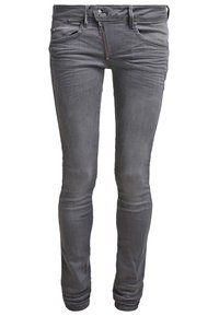 Slim-fit grå denimjeans med dragkedja, femficksdesign och lätt blekning, vilket ger en mjuk och elastisk känsla.